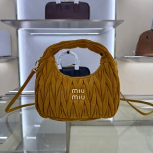 Wander matelassé suede bag