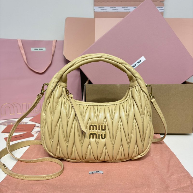 Wander matelassé suede bag