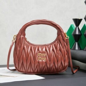 Wander matelassé suede bag