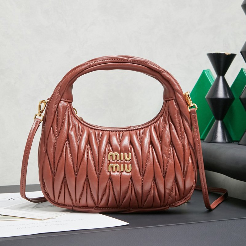 Wander matelassé suede bag