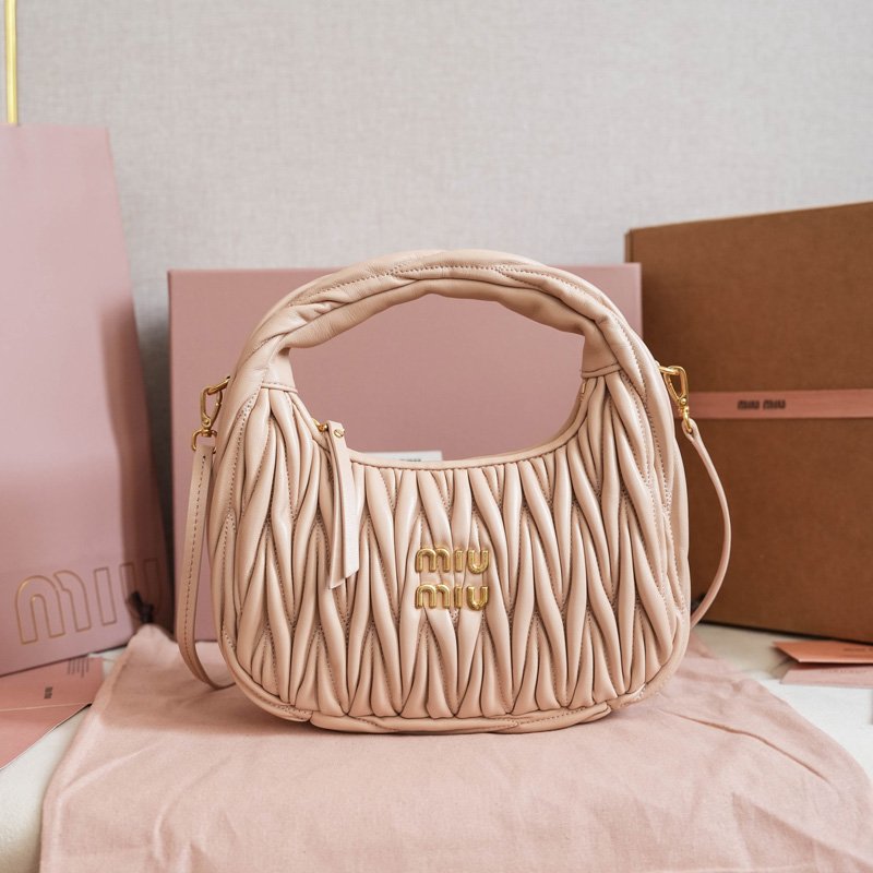 Wander matelassé suede bag